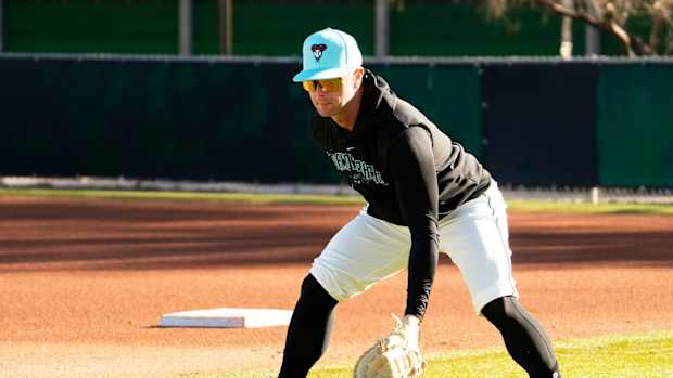 Christian Walker fielding baseballs at Spring Training Practice